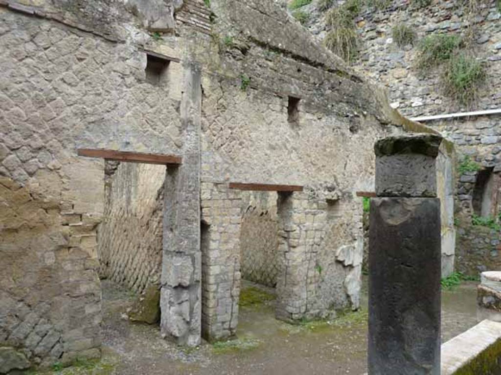 VII.2 Herculaneum. May 2010. Doorways on south side of peristyle area.